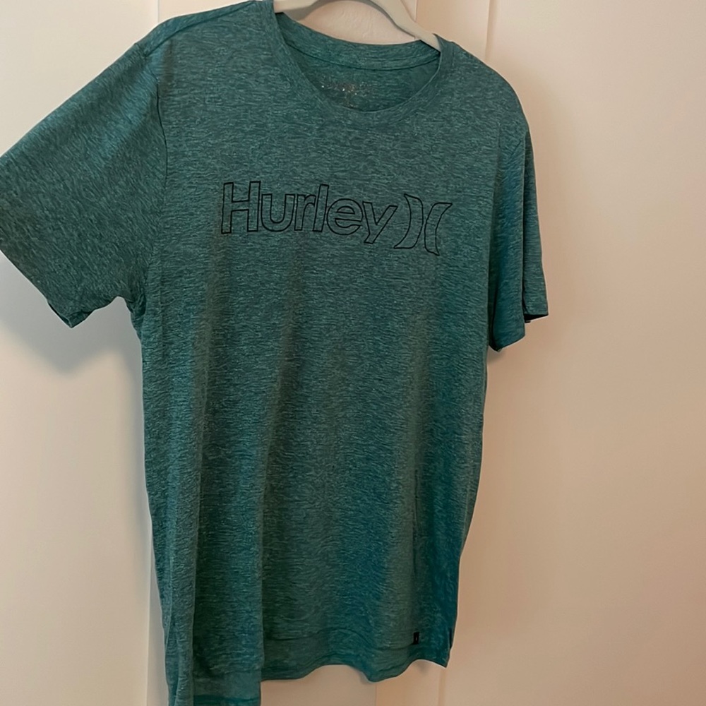 Blue ish green Hurley shirt. Worn a few times